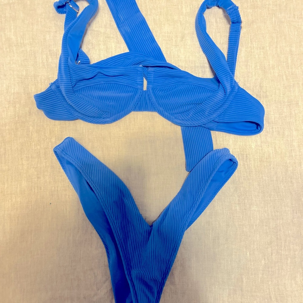 Camille Kostek blue bikini
